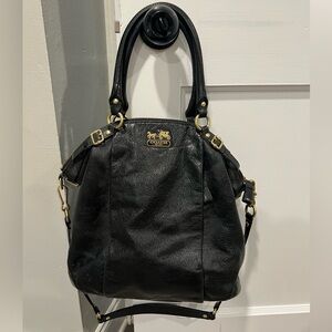 Coach black crossbody purse with gold accents